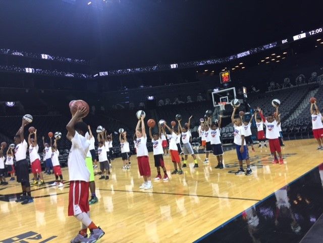 Brooklyn USA Basketball youth players shooting practice at Barclays Center